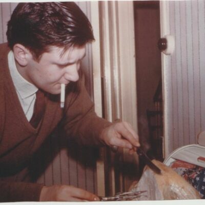 John Andrews carving a Christmas Turkey c 1960